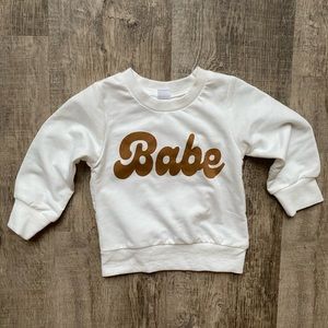 Baby sweater size 6 months.